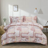 Camille printed reversible comforter set, 3 piece, double/queen, on a made bed