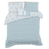 Isabelle light blue geometric jacquard comforter set, 5 piece, double/queen, on a made bed