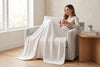 Couverture jacquard, blanc cassé, dans un décor
