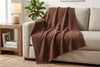 Couverture jacquard, cèdre, dans un décor