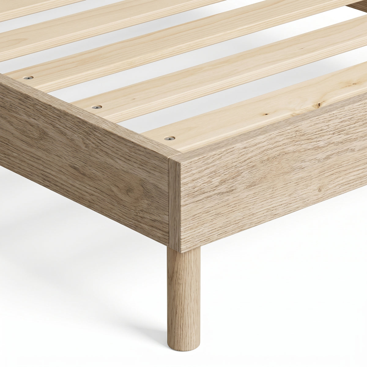 Queen platform bed frame in natural oak-look finish, bedroom styling view 5