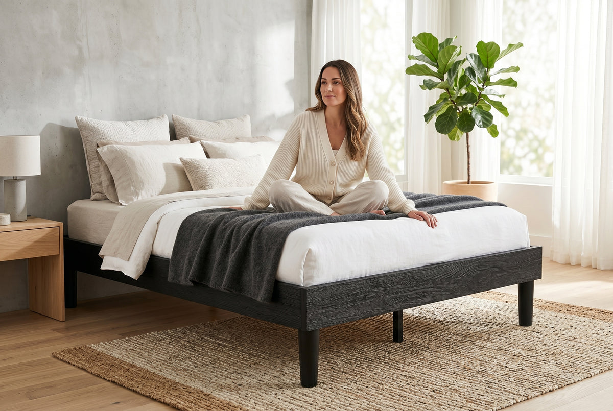 Queen platform bed frame in black wood-grain finish, bedroom styling view 3