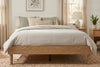 King platform bed frame in natural oak-look finish, bedroom styling view 2