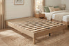 King platform bed frame in natural oak-look finish, bedroom styling view 5