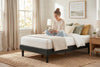 Double platform bed frame in black wood-grain finish, bedroom styling view 2