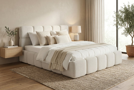 King bouclé upholstered bed frame in off-white with padded block headboard