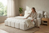 King bouclé upholstered bed frame in off-white, bedroom styling view 3